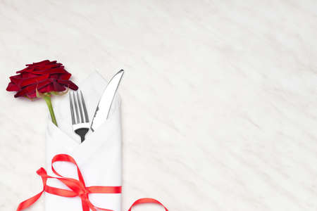 Beautiful table setting for Valentine's Day on light backgroundの写真素材