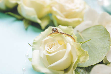 Rose flower with beautiful engagement ring, closeupの写真素材