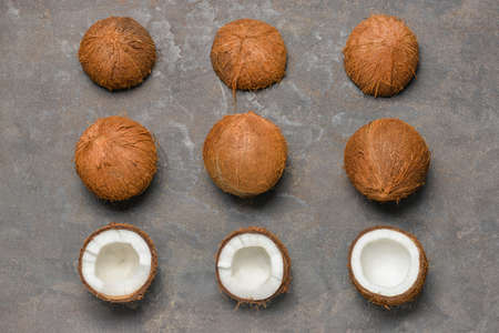 Ripe coconuts on gray backgroundの写真素材
