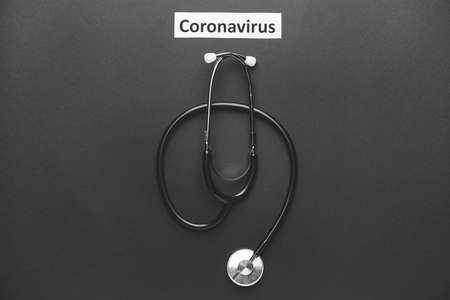 Stethoscope with text "Coronavirus" on dark backgroundの写真素材