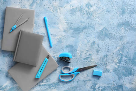 Set of school supplies on color backgroundの写真素材