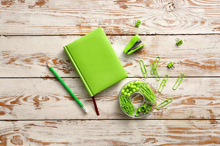 Set of school supplies on wooden backgroundの写真素材