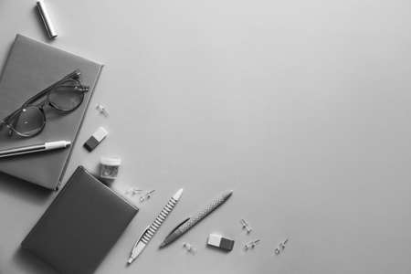 Set of school supplies with eyeglasses on gray backgroundの写真素材
