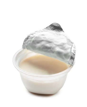 Plastic cup with tasty yogurt on white backgroundの写真素材