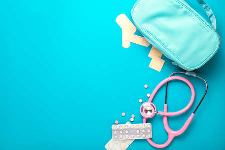 First aid kit on color backgroundの写真素材