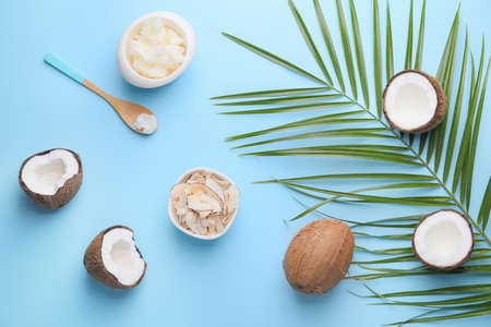 Composition with different coconut products on color background