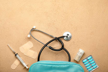 First aid kit on color backgroundの写真素材