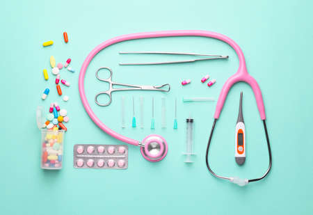 Composition with medical supplies on color backgroundの写真素材
