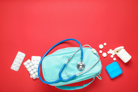 First aid kit on color backgroundの写真素材