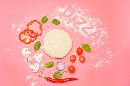 Ingredients for tasty pizza on color backgroundの写真素材