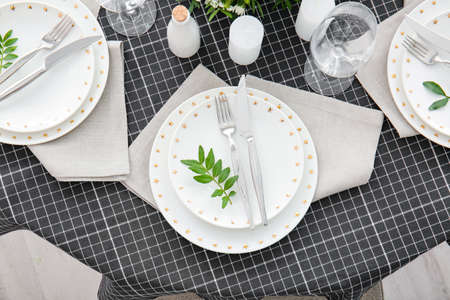 Beautiful table setting for wedding celebration in restaurantの写真素材