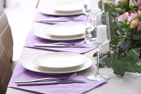 Beautiful table setting for wedding celebration in restaurant