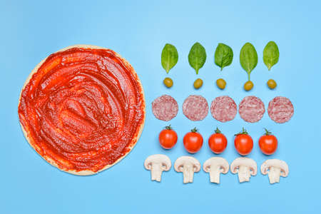Ingredients for tasty pizza on color backgroundの写真素材