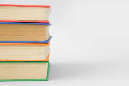 Many books on light background, closeupの写真素材