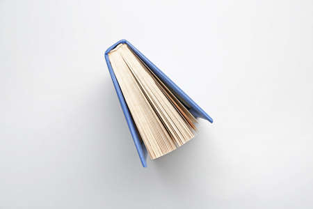 Book on light background, top viewの写真素材
