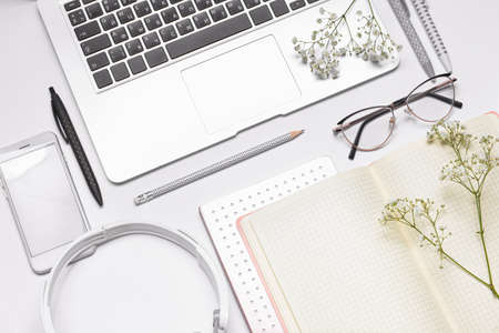 Set of school supplies with modern devices on white backgroundの写真素材