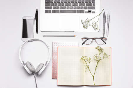 Set of school supplies with modern devices on white backgroundの写真素材