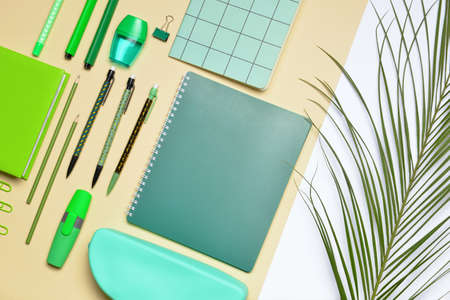 Set of school supplies on color backgroundの写真素材