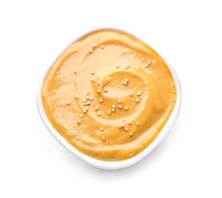 Bowl of tasty honey mustard sauce on white backgroundの写真素材