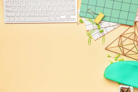 Set of school supplies with computer keyboard on color backgroundの写真素材