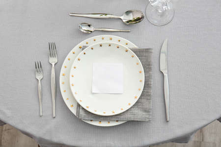 Beautiful table setting in restaurantの写真素材