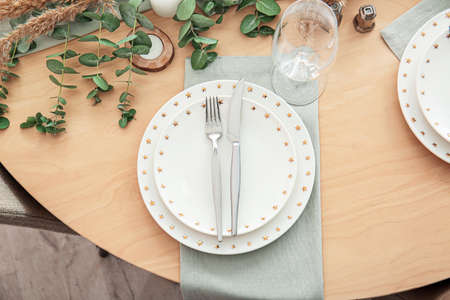 Beautiful table setting for wedding celebration in restaurantの写真素材