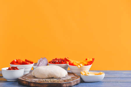 Ingredients for tasty pizza on tableの写真素材