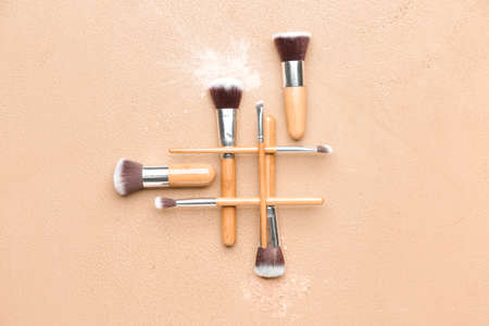 Set of makeup brushes on color backgroundの写真素材