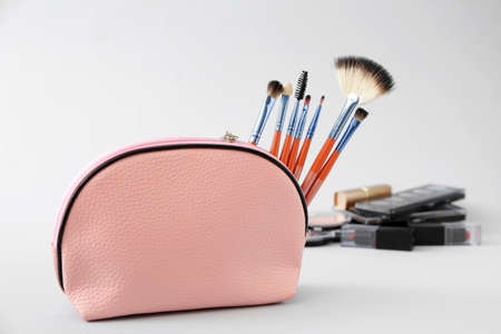 Set of makeup brushes on gray backgroundの写真素材
