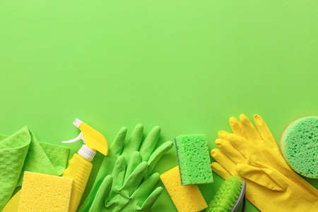 Set of cleaning supplies on color backgroundの写真素材