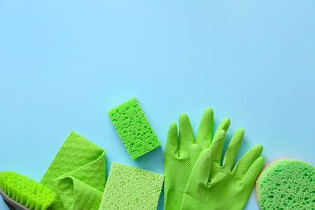 Set of cleaning supplies on color backgroundの写真素材