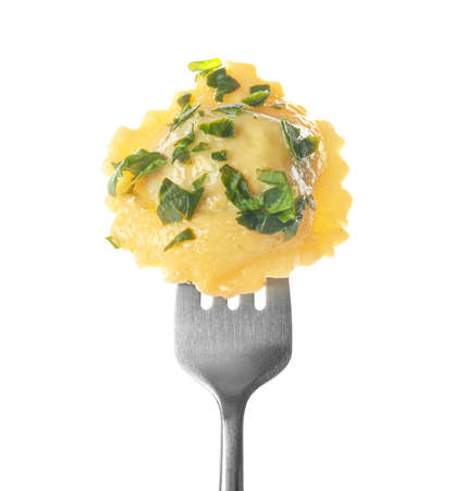 Fork with tasty ravioli on white backgroundの写真素材