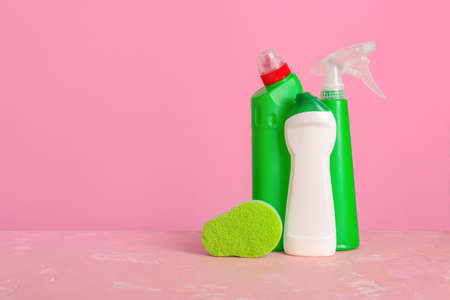 Set of cleaning supplies on color backgroundの写真素材