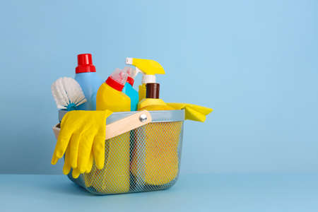 Set of cleaning supplies on color backgroundの写真素材