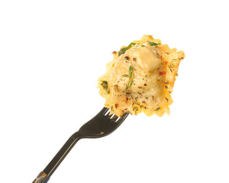 Fork with tasty ravioli on white backgroundの写真素材