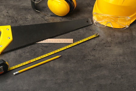Builder's supplies on dark background