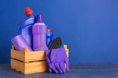 Set of cleaning supplies on color backgroundの写真素材