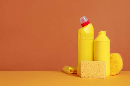 Set of cleaning supplies on color backgroundの写真素材