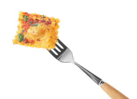 Fork with tasty ravioli on white backgroundの写真素材
