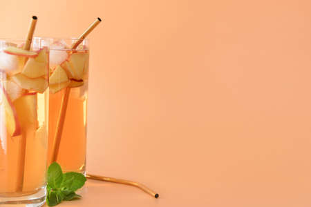 Glasses of tasty cold ice tea on color backgroundの写真素材