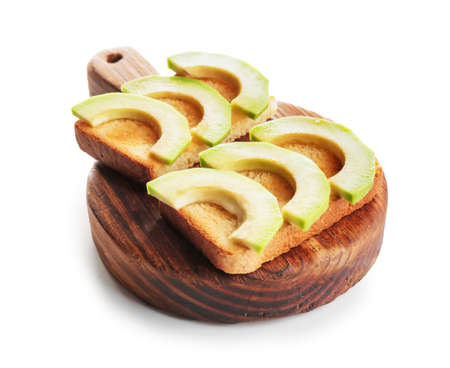 Board with tasty avocado sandwiches on white backgroundの写真素材
