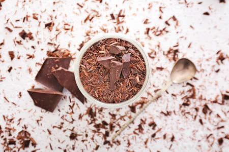 Glass with tasty panna cotta on white backgroundの写真素材