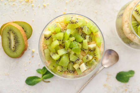 Glass with tasty panna cotta on white backgroundの写真素材