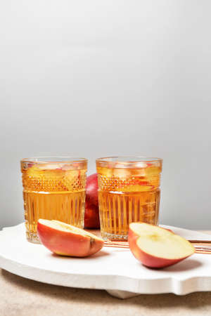 Glasses of tasty cold ice tea on tableの写真素材