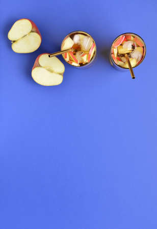 Glasses of tasty cold ice tea on color backgroundの写真素材