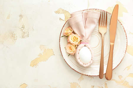 Beautiful Easter table setting on white backgroundの写真素材