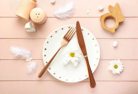 Beautiful Easter table setting on wooden backgroundの写真素材