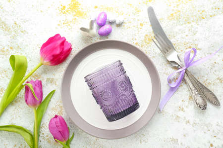 Beautiful Easter table setting on white backgroundの写真素材
