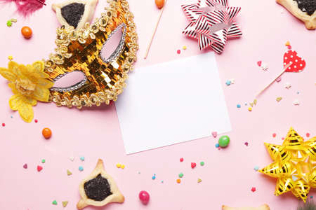 Beautiful composition for Purim holiday with place for text on color backgroundの写真素材