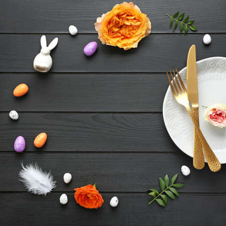 Beautiful Easter table setting on dark wooden backgroundの写真素材